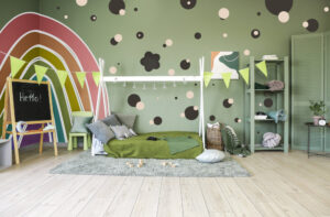Painting Ideas for Kids Rooms. Children's Room With Comfortable Bed And Beautiful painted specialty wall with design.