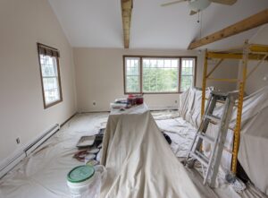 Professional Painters. Room in a family house being painted.