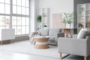 Exceptional Painting in Victoria, BC. Interior of stylish living room with vase and blooming branches.